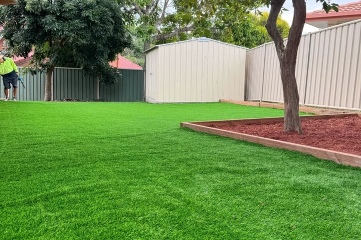A finished back-garden artificial lawn